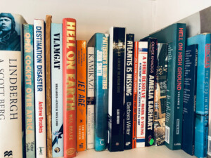 various aviation books on a shelf